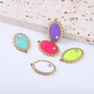 Colorful enamel teardrop charms with gold serrated edges and small rhinestones