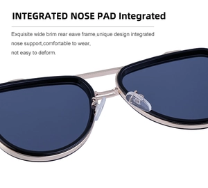 Detail of integrated nose pads and gold metal bridge on retro double-beam sunglasses