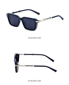 Detail view of black square sunglasses with gold metal temples and mesh decor