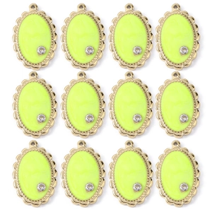 Set of 12 fluorescent green teardrop pendants with gold wavy edges and rhinestones