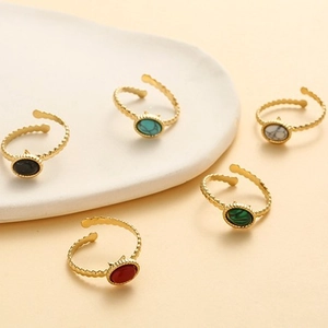 Minimalist gold oval natural stone rings set with elegant wave texture band