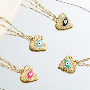 Détails de pendentifs cœur œil protecteur en quatre couleurs avec zircons brillants