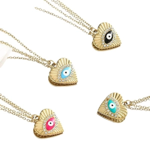 Médaillon coeur doré oeil protecteur avec cristaux pavés en quatre couleurs éclatantes