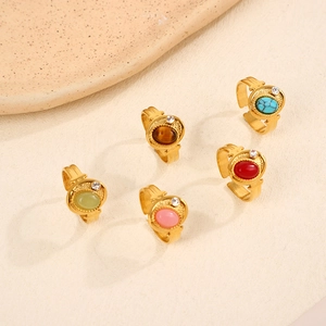 Set of five vintage gold rings with colorful natural stones and open adjustable band