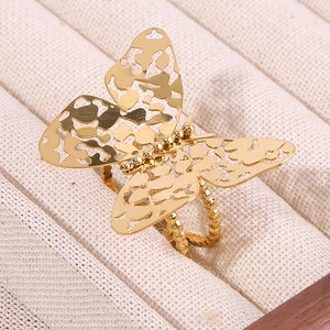 Exaggerated golden hollow butterfly ring with hammered texture in high-end stainless steel