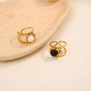 Vintage gold hollow stainless steel ring with natural black and white oval stones