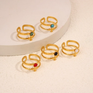 Detail of 18K gold stainless steel double layer cross rings with colorful stones