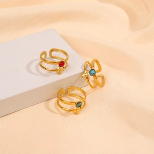 Close-up of three 18K gold-plated stainless steel double-layer rings with colorful stones