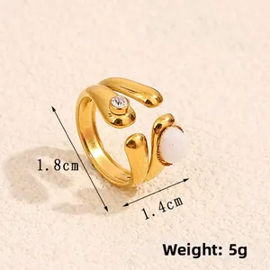 Detailed size view of retro geometric open ring with natural stone inlay and gold finish