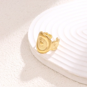 Adjustable golden stainless steel ring with elegant abstract wave spiral texture