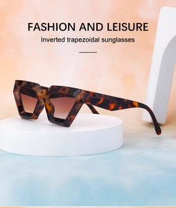 Detail of fashion inverted trapezoidal tortoiseshell sunglasses on a geometric platform