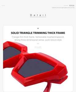 Detail view of red thick-frame geometric cat-eye sunglasses with anti-blue light lenses