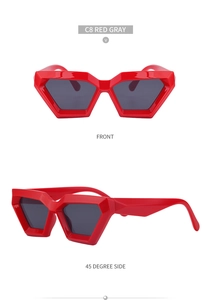 Front and side angles of red geometric cat-eye sunglasses with grey lenses