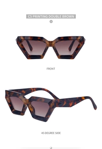 Detailed view of small cat eye sunglasses with dark tortoiseshell texture and brown lenses