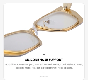 Detail of adjustable silicone nose pads on gold metallic oversized cat eye sunglasses