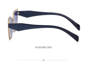 Detailed 90-degree side view of cat-eye sunglasses with golden metal frame and gradient lenses