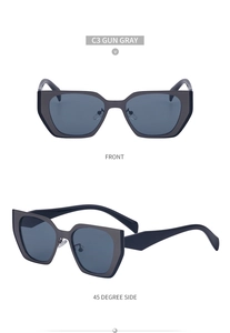 Detail view of gun gray geometric cat-eye sunglasses with dark gray lenses