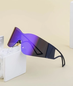Detail of Y2K rimless sports sunglasses with purple mirrored lens and black cutout temples