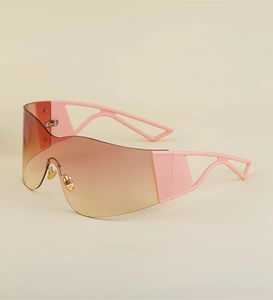 Detail of pink Y2K rimless sports sunglasses with wrap-around frame and gradient lenses
