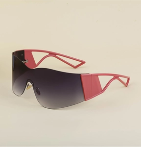 Detail of Y2K sporty rimless sunglasses with gradient grey lenses and pink hollowed temples