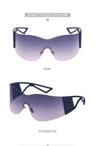 Detail view of matte black Y2K wraparound sunglasses with purple pink gradient lens