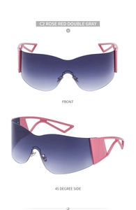 Detail view of rose red Y2K shield sunglasses with hollow geometric temple design