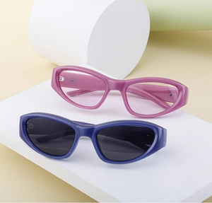Pink and blue Y2K cat-eye sunglasses with star accents and streamline frames displayed