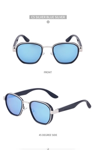 Detail view of silver metal bridge and blue mirrored polarized lenses on oval sunglasses