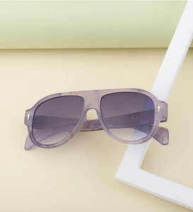 Detail of purple marble aviator sunglasses with silver accents and gradient lenses