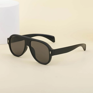 Classic oversized aviator sunglasses with black frame and dark lenses for outdoor driving