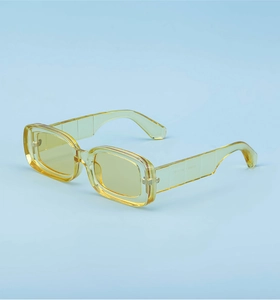 Macro detail of translucent yellow square sunglasses showing temple frame specifications
