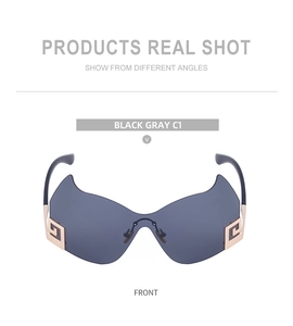 Vorderansicht der schwarzgrauen, rahmenlosen Oversize-Radbrille mit goldenen Bügeln