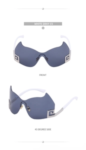 Detailansicht der weißen randlosen Oversize-Sonnenbrille mit griechischem Metallmuster