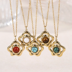 Hollow flower tiger eye stone pendant necklace with vintage gold chain for elegant women
