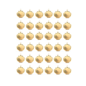 Macro view of 36 pieces of 18K gold plated shell charms in a neat 6x6 grid arrangement
