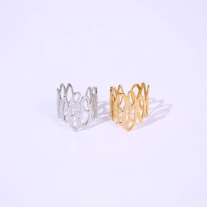 Detail of adjustable hollow wavy rings in gold and silver finish on a clean background