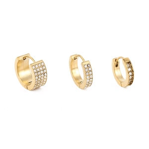 Detailed view of three gold-plated stainless steel hoop earrings with crystal pavé inlay