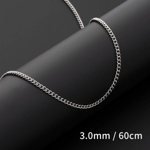 Macro shot of 3.0mm width and 60cm length silver curb chain in titanium steel