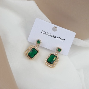 Gold stainless steel earrings with emerald green rectangular stones and zircon halo