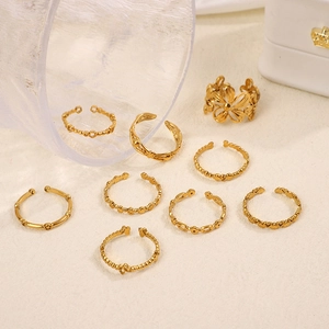 Lot de 9 bagues élégantes en acier titane doré avec papillon et cœur pour femme