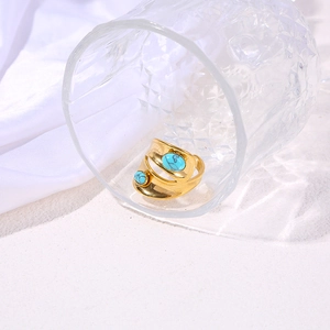 Bohemian gold wide band double-layer ring with two oval turquoise stones on glass