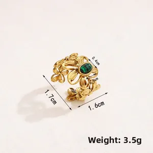 Detailed top view of gold flower ring with green stone and dimension measurements