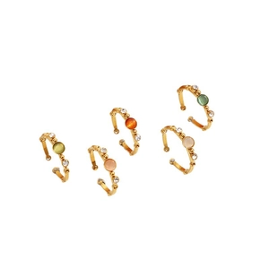 Five-piece set of gold bamboo-style open rings featuring colorful stones and rhinestones