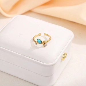 Elegant gold oval turquoise open ring with white zircon stones and beaded texture