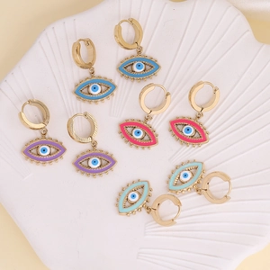 Chic Evil Eye earrings in four colors set on a white shell plate for elegant fashion styles