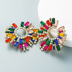 Detailed view of colorful rhinestone earrings with vibrant crystals in a floral radial pattern