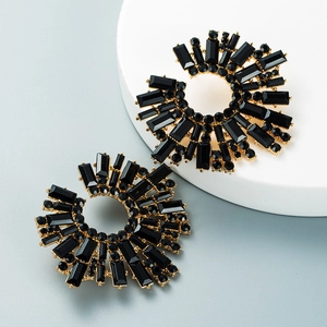 Chic gold-tone sunflower earrings with black rhinestones for party wear, stylish design