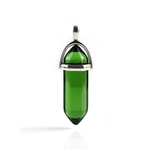 Wire wrapped hexagonal green crystal pillar pendant with silver clasp on white base