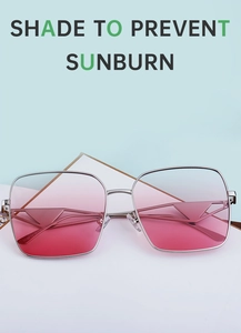 Detail view of pink gradient lenses and silver metal frame with technical markings