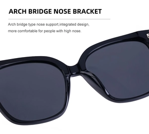 Detail of ergonomic arch bridge nose pads on black oversized polarized sunglasses
